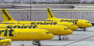 Yellow airplanes parked on the airport tarmac