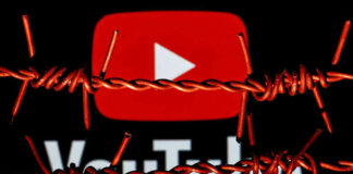 YouTube logo behind barbed wire lines