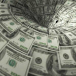 Hundred dollar bills swirling into a financial vortex