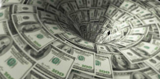 Hundred dollar bills swirling into a financial vortex