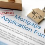 Credit Score TRICK Banks Hope You Miss Approved mortgage application form with a house key and keychain