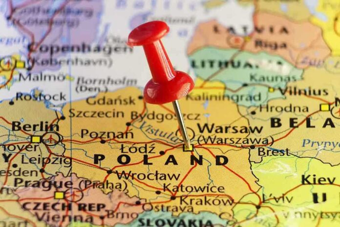 shutterstock_510294343.jpg A map of Poland with a red pushpin marking the location
