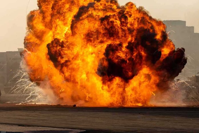 shutterstock_1553348672 (4).jpg A large explosion creating a massive fireball and smoke