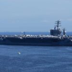 $60 Million Fighter Vanishes Off Carrier A large aircraft carrier sailing in the ocean