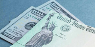 $100 bill and U.S. Treasury check.