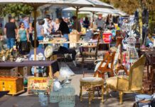 Fentanyl Bust at Georgia Market Shocks Community A bustling flea market with various antique items and furniture for sale