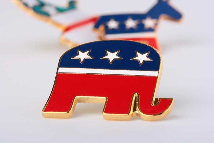 A red, white, and blue elephant pin representing the Republican Party