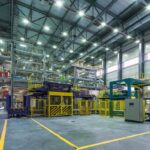 Interior view of a modern industrial facility with manufacturing equipment