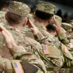 Private Citizen RESCUES Military Payroll — Unbelievable Intervention Soldiers in camouflage uniforms saluting in formation outdoors