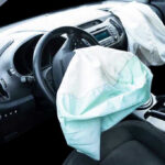 Quiet Street Hides Half-TON Meth Pipeline Deployed airbags in cars interior.