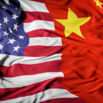 Mayor’s Shocking Plea – Secret Agent for China?! United States flag merged with China flag.