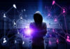 Hacker in hooded sweatshirt with digital connections overlay.