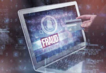 Newsom Aide CAUGHT in Massive Fraud Operation Person holding credit card near laptop displaying Fraud.