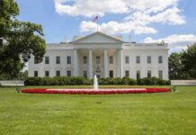 White House Chaos: Gunman Claiming to Be Jesus The White House with a fountain and flower beds in front