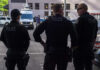 Fourth Amendment Win Shocks Police Three police officers standing on a city street.