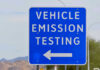 Diesel Mechanic Pardoned—Regulators Rattled Blue sign for vehicle emission testing direction.