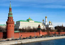 Putin’s ‘Peace’ Ultimatum Stuns Analysts The Kremlins towers and cathedrals beside a river.