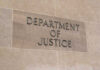 School Murder Verdict Ignites Fury Department of Justice sign on a building.