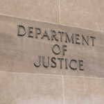 School Murder Verdict Ignites Fury Department of Justice sign on a building.