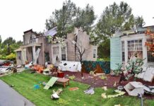 Mayor’s Brother Turns On LA Houses with significant storm damage and debris scattered around the yard