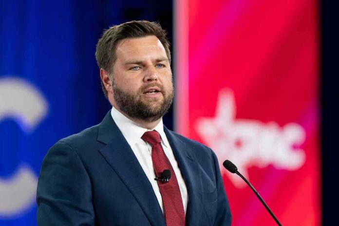 shutterstock_2186937099-11- A man in a suit delivering a speech at a conference