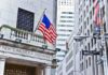 Bernie’s 50% AI Grab Shocks Wall Street Facade of the New York Stock Exchange with an American flag and Wall Street sign