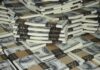 Piles of bundled cash stacked together