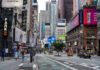 Mayor’s Freeze — Prices Spike Anyway? Times Square street scene with storefronts and advertisements.