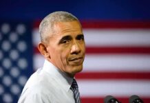 Viral Edit Warps Obama’s Voting Answer man speaking at podium with american flag backdrop