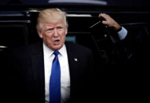Leakers Hunted — Pentagon on Notice man in suit stepping out of a vehicle