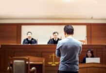 Tupac Murder Trial Twist: No Gun, No DNA defendant stands before judges in a courtroom