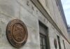 Trump Tax Windfall Stuns Treasury U.S. Treasury building exterior with bronze seal on stone wall