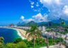 Copacabana Beach coastline with city skyline and mountains