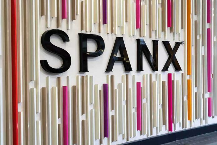 shutterstock_1377549986 Spanx logo on a colorful wall installation