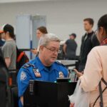 TSA’s Nutty Crackdown Stuns Travelers Bill Bergey, a TSA officer, checks a traveler's documents at an airport security checkpoint