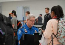 TSA’s Nutty Crackdown Stuns Travelers Bill Bergey, a TSA officer, checks a traveler's documents at an airport security checkpoint