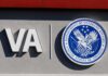 Grant Vanishes – Trans Rules Spark NYC Walkout VA logo and Department of Veterans Affairs seal on building wall