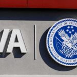 Grant Vanishes – Trans Rules Spark NYC Walkout VA logo and Department of Veterans Affairs seal on building wall