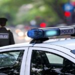 JD Vance Claims Law-And-Order Win police car roof with blue emergency lights