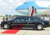 Xi Lands, Leverage Game Begins Presidential limousine beside a large blue-and-white jet on a runway