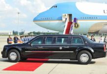 Xi Lands, Leverage Game Begins Presidential limousine beside a large blue-and-white jet on a runway