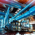 Diesel Ban Backfires: Prices Whiplash Ahead Industrial plant with large metal pipes and gauges