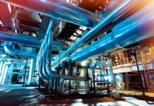 Diesel Ban Backfires: Prices Whiplash Ahead Industrial plant with large metal pipes and gauges