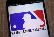 Major League Baseball logo on a smartphone screen