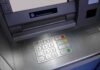Bank Blunder: $128K Left on ATM Close-up of an ATM keypad with numeric buttons and function keys