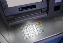 Bank Blunder: $128K Left on ATM Close-up of an ATM keypad with numeric buttons and function keys
