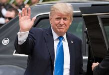 Trump Dangles 51st State Beside Giant Tanker Donald Trump waves while standing beside a black vehicle