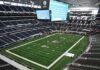 Stadium Rappel Goes Horribly Wrong American football stadium interior with large central video board