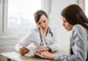 Mushrooms Jolt Alzheimer’s Doctor consulting a patient at a desk