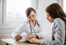 Mushrooms Jolt Alzheimer’s Doctor consulting a patient at a desk